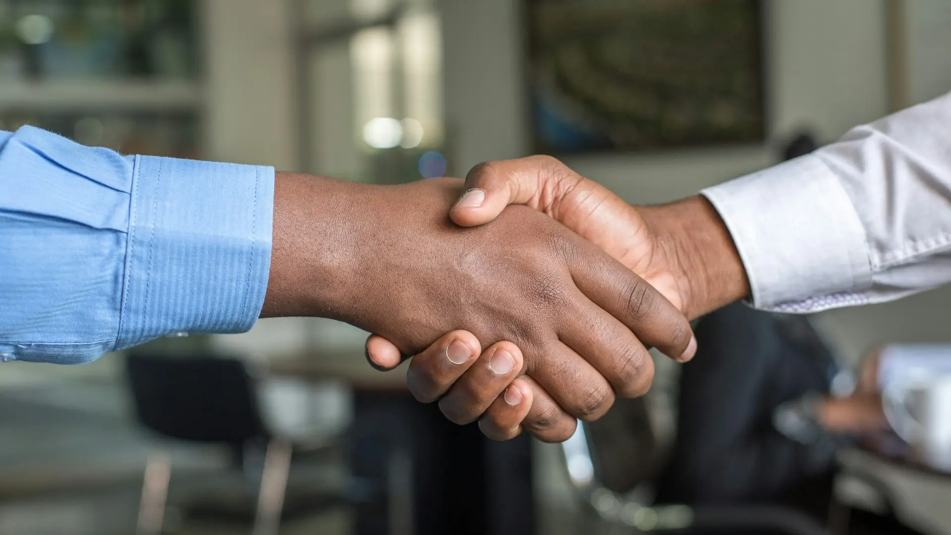 two people shaking hands